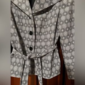 Suit Studio jacket. Size 12 with cute yet professional design!